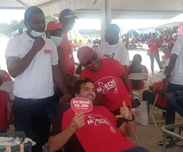 BLOOD.....Ms-Stephens-right-with-Mr-Jaber-both-in-the-red-‘MarchMarch-T-shirt-after-donaing-blood